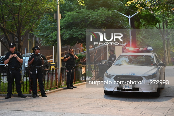 Police are present at the crime scene in Manhattan, New York, United States, on May 25, 2024. An unidentified male victim is being transport...