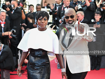 Viola Davis and Julius Tennon are attending the Red Carpet of the closing ceremony at the 77th annual Cannes Film Festival at Palais des Fes...