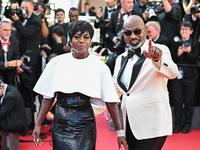 Viola Davis and Julius Tennon are attending the Red Carpet of the closing ceremony at the 77th annual Cannes Film Festival at Palais des Fes...