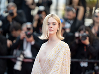 Elle Fanning is attending the Red Carpet of the closing ceremony at the 77th annual Cannes Film Festival at Palais des Festivals in Cannes,...