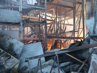 A fire is raging at an Epicentr K construction supermarket hit with two Russian glide bombs in Kharkiv, Ukraine, on May 25, 2024. At least f...