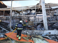 Rescuers are responding to a Russian glide bomb attack on an Epicentr K construction supermarket in Kharkiv, Ukraine, on May 25, 2024. At le...