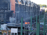 A fire is raging at an Epicentr K construction supermarket hit with two Russian glide bombs in Kharkiv, Ukraine, on May 25, 2024. At least f...