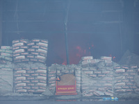 Sacks with cement are being pictured at an Epicentr K construction supermarket hit by two Russian glide bombs in Kharkiv, Ukraine, on May 25...