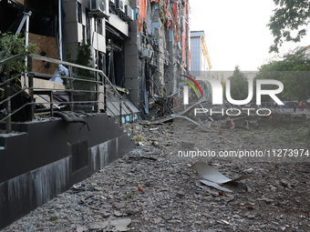 An office building is being destroyed by a Russian missile strike in central Kharkiv, Ukraine, on May 25, 2024. NO USE RUSSIA. NO USE BELARU...