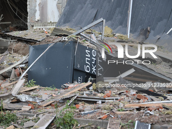 A parcel locker is being seen among the debris at an office building destroyed by a Russian missile strike in central Kharkiv, Ukraine, on M...