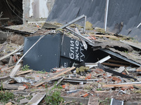 A parcel locker is being seen among the debris at an office building destroyed by a Russian missile strike in central Kharkiv, Ukraine, on M...