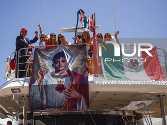 Charles Leclerc's fans are seen on a yacht during Practice 3 ahead of the F1 Grand Prix of Monaco at Circuit de Monaco on May 25, 2024 in Mo...