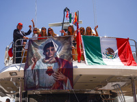 Charles Leclerc's fans are seen on a yacht during Practice 3 ahead of the F1 Grand Prix of Monaco at Circuit de Monaco on May 25, 2024 in Mo...