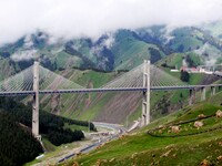 The Guozigou Bridge is being seen in the clouds in Bozhou, China, on May 25, 2024. (
