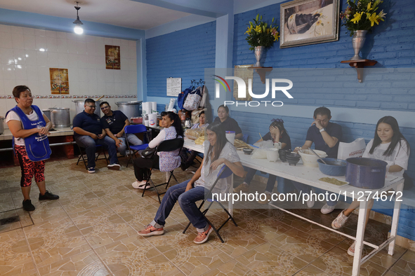 Inhabitants of Culhuacan in the extreme south of Mexico City are gathering for a meal before a procession to the Sanctuary of the Lord of Ca...