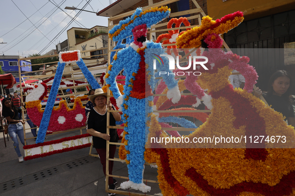 The inhabitants of Culhuacan in the extreme south of Mexico City are making a portada during a procession to the Sanctuary of the Lord of Ca...