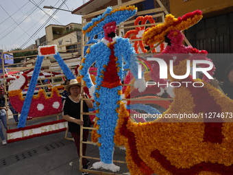 The inhabitants of Culhuacan in the extreme south of Mexico City are making a portada during a procession to the Sanctuary of the Lord of Ca...