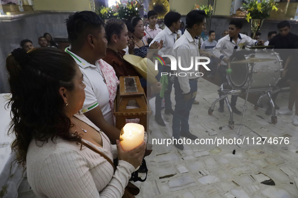 Inhabitants of Culhuacan in the extreme south of Mexico City are attending a mass at the Sanctuary of the Lord of Calvary on the eve of the...