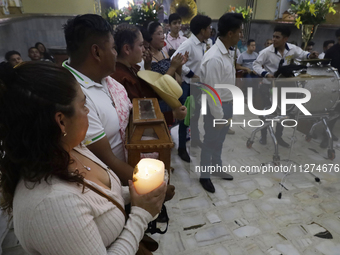 Inhabitants of Culhuacan in the extreme south of Mexico City are attending a mass at the Sanctuary of the Lord of Calvary on the eve of the...