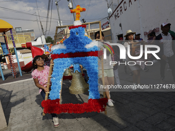 Inhabitants of Culhuacan in the extreme south of Mexico City are carrying a portada during a procession to the Sanctuary of the Lord of Calv...