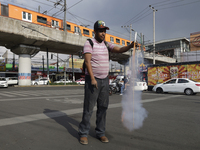 Inhabitants of Culhuacan in the extreme south of Mexico City are burning pyrotechnics during a procession to the Sanctuary of the Lord of Ca...