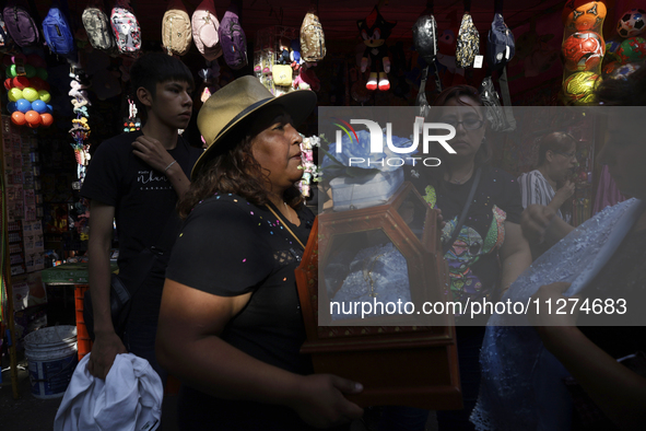 Inhabitants of Culhuacan in the extreme south of Mexico City are carrying religious images during a procession to the Sanctuary of the Lord...