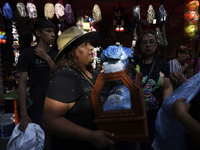 Inhabitants of Culhuacan in the extreme south of Mexico City are carrying religious images during a procession to the Sanctuary of the Lord...