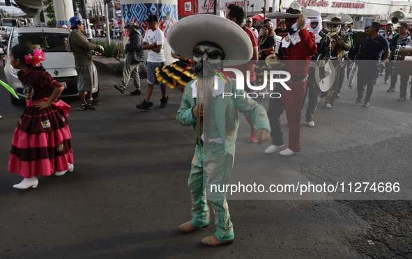 Inhabitants of Culhuacan in the extreme south of Mexico City are dancing during a procession to the Sanctuary of the Lord of Calvary on the...