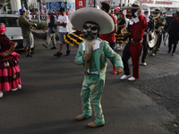 Inhabitants of Culhuacan in the extreme south of Mexico City are dancing during a procession to the Sanctuary of the Lord of Calvary on the...