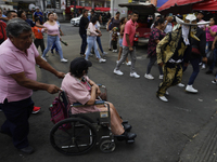 Inhabitants of Culhuacan in the extreme south of Mexico City are participating in a procession to the Sanctuary of the Lord of Calvary on th...