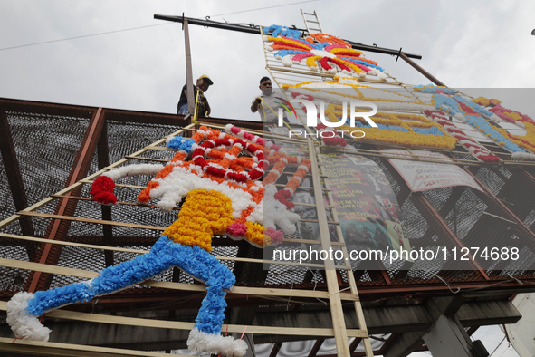 Inhabitants of Culhuacan in the extreme south of Mexico City are carrying a portada during a procession to the Sanctuary of the Lord of Calv...