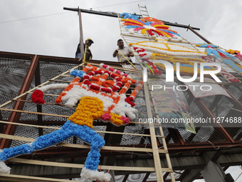 Inhabitants of Culhuacan in the extreme south of Mexico City are carrying a portada during a procession to the Sanctuary of the Lord of Calv...