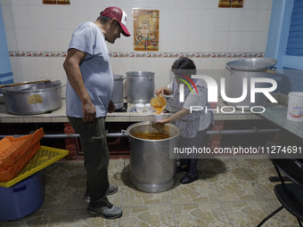 Inhabitants of Culhuacan in the extreme south of Mexico City are convivial during lunchtime at the end of a procession to the Sanctuary of t...