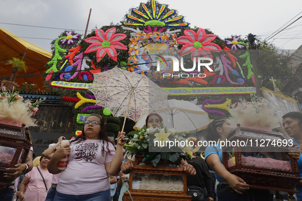 Inhabitants of Culhuacan in the extreme south of Mexico City are carrying religious images during a procession to the Sanctuary of the Lord...