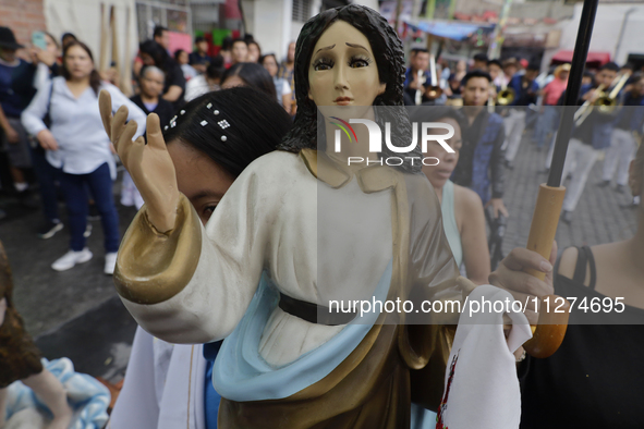 Inhabitants of Culhuacan in the extreme south of Mexico City are carrying religious images during a procession to the Sanctuary of the Lord...