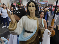 Inhabitants of Culhuacan in the extreme south of Mexico City are carrying religious images during a procession to the Sanctuary of the Lord...