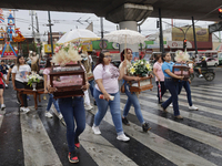 Inhabitants of Culhuacan in the extreme south of Mexico City are carrying religious images during a procession to the Sanctuary of the Lord...