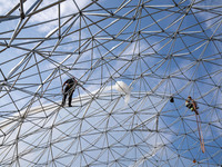 Workers are building a new spherical greenhouse in Hefei, Anhui province, China, on May 25, 2024. After the completion of the spherical gree...