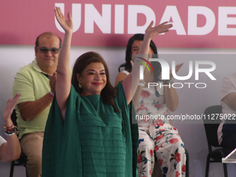 Clara Brugada, candidate for the head of Government of Mexico City for the 'Juntos Hagamos Historia' alliance, is saluting during a rally ca...