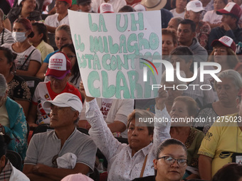 Supporters of Clara Brugada, candidate for the head of Government of Mexico City for the 'Juntos Hagamos Historia' alliance, are seen during...