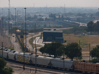 Vehicles enter the United States in Eagle Pass, Texas on May 25, 2024 via a port of entry from Mexico. (