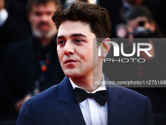 Xavier Dolan attends the Red Carpet of the closing ceremony at the 77th annual Cannes Film Festival at Palais des Festivals on May 25, 2024...
