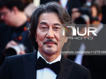 Koji Yakusho attends the Red Carpet of the closing ceremony at the 77th annual Cannes Film Festival at Palais des Festivals on May 25, 2024...