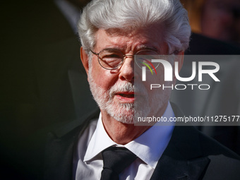 George Lucas attends the Red Carpet of the closing ceremony at the 77th annual Cannes Film Festival at Palais des Festivals on May 25, 2024...