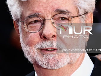 George Lucas attends the Red Carpet of the closing ceremony at the 77th annual Cannes Film Festival at Palais des Festivals on May 25, 2024...