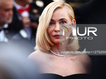 Emmanuelle Beart attends the Red Carpet of the closing ceremony at the 77th annual Cannes Film Festival at Palais des Festivals on May 25, 2...