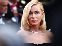 Emmanuelle Beart attends the Red Carpet of the closing ceremony at the 77th annual Cannes Film Festival at Palais des Festivals on May 25, 2...