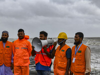 Cyclone Preparedness Program workers are using a megaphone at Kuakata beach area in Kuakata, Bangladesh, on May 26, 2024, ahead of Cyclone R...