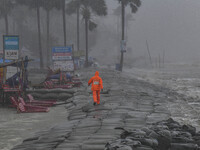Cyclone Preparedness Program workers are warning visitors and local people at Kuakata beach area in Kuakata, Bangladesh, on May 26, 2024, ah...