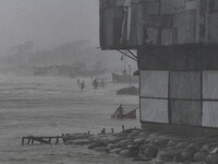 Fishermen are fishing in Kuakata, Bangladesh, on May 26, 2024, ahead of Cyclone Remal landfall. (