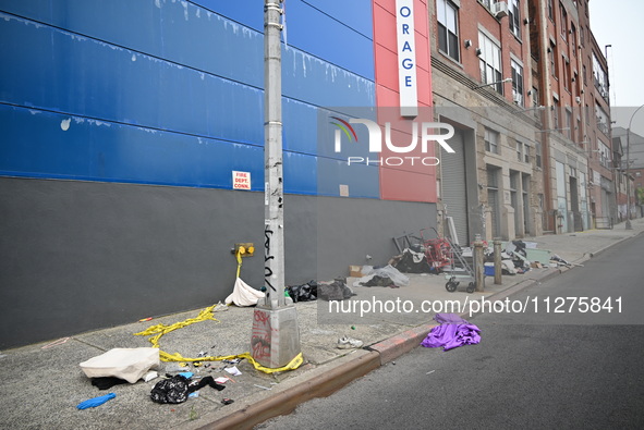 The aftermath scene of a pedestrian struck incident is being photographed in Brooklyn, New York, United States, on May 25, 2024. At approxim...