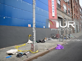 The aftermath scene of a pedestrian struck incident is being photographed in Brooklyn, New York, United States, on May 25, 2024. At approxim...