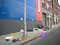 The aftermath scene of a pedestrian struck incident is being photographed in Brooklyn, New York, United States, on May 25, 2024. At approxim...