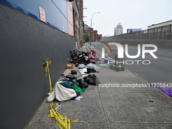 The aftermath scene of a pedestrian struck incident is being photographed in Brooklyn, New York, United States, on May 25, 2024. At approxim...